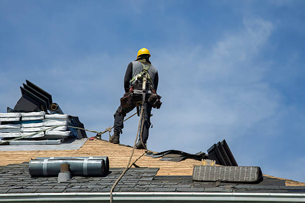 Professional Roof Replacement technician working in Peebles, OH